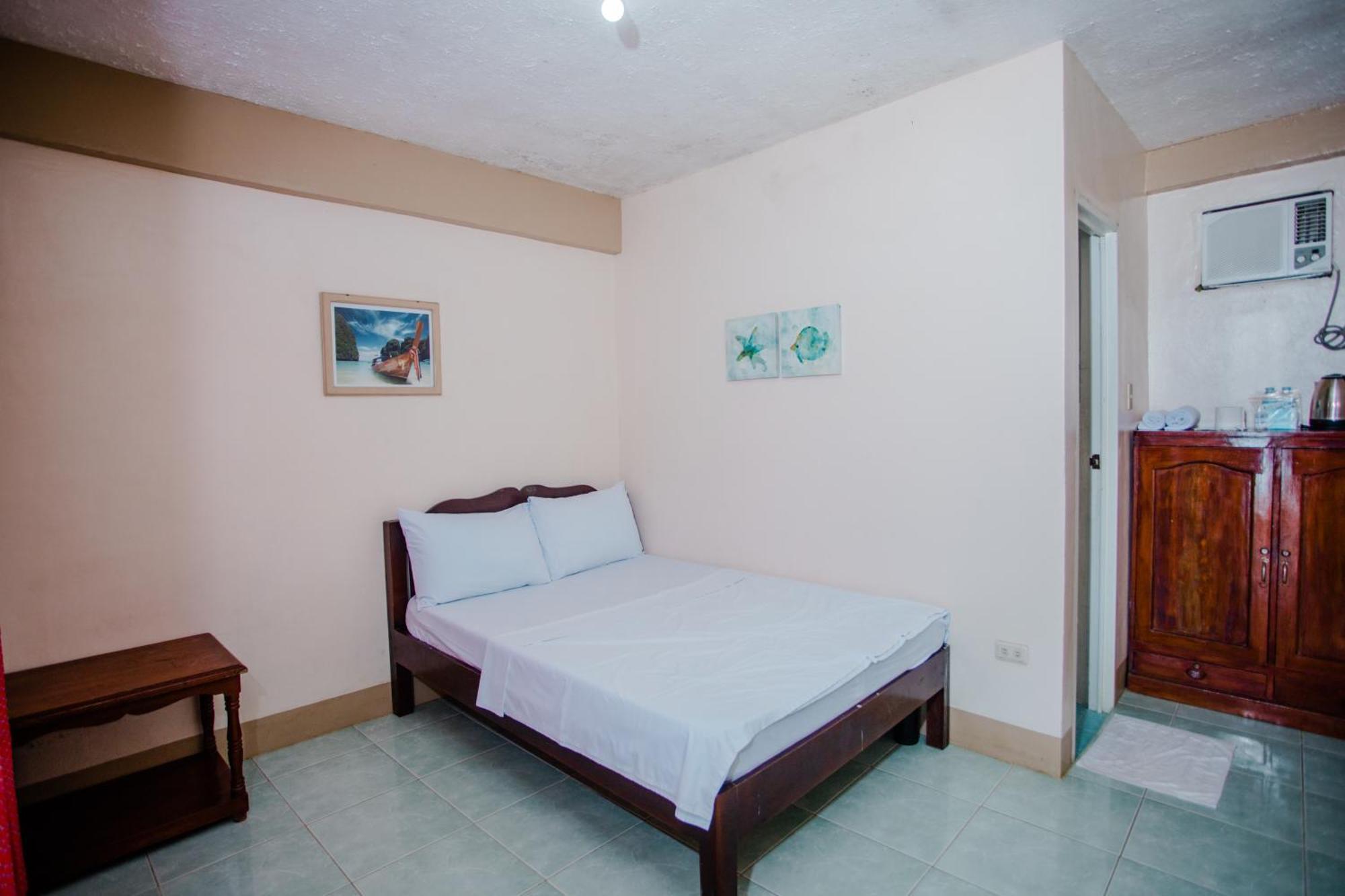Durhan White Beach Resort Powered By Cocotel Tabuelan Екстериор снимка